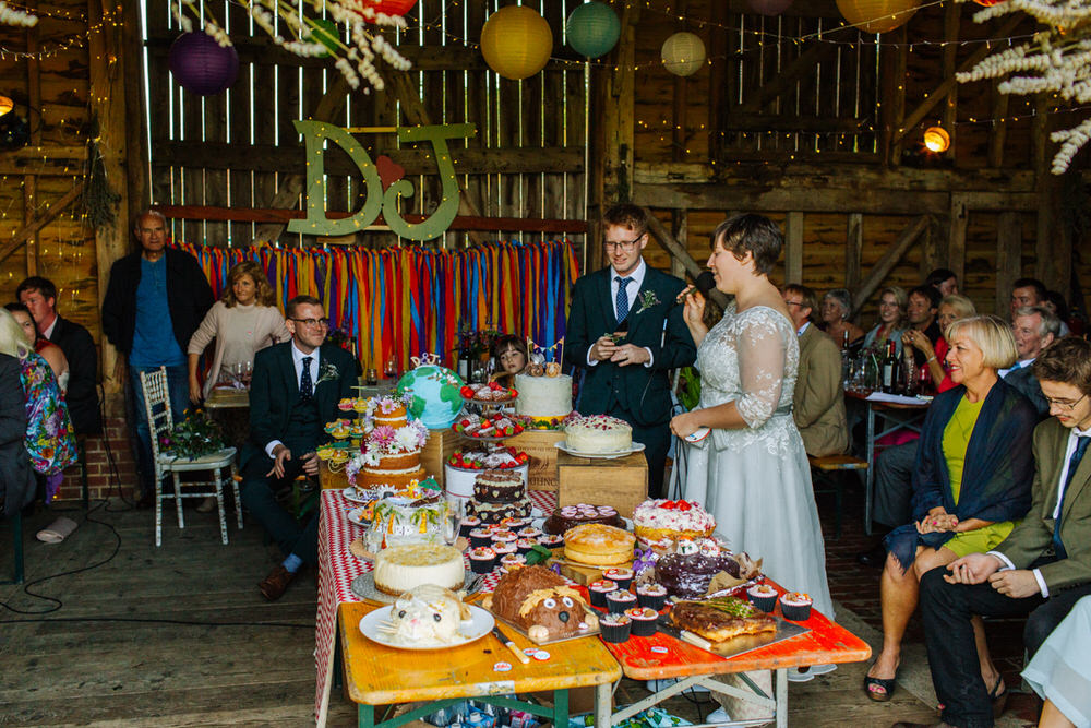 Bride Bridal Tea Length Sleeved Dress Multicoloured Bottle Green Suit Three Piece Dessert Table Bake Off Secret Barn Sussex Wedding Rainbow Colourful Yvonne Lishman Photography