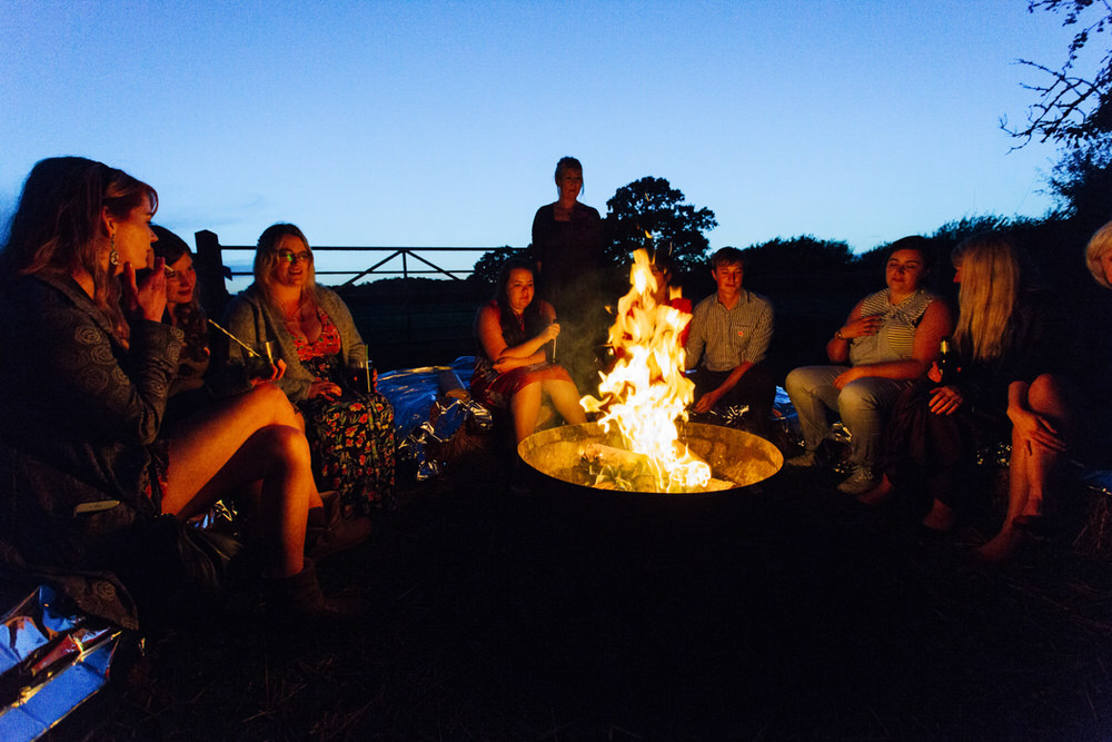 Fire Pit Camping Secret Barn Sussex Wedding Rainbow Colourful Yvonne Lishman Photography