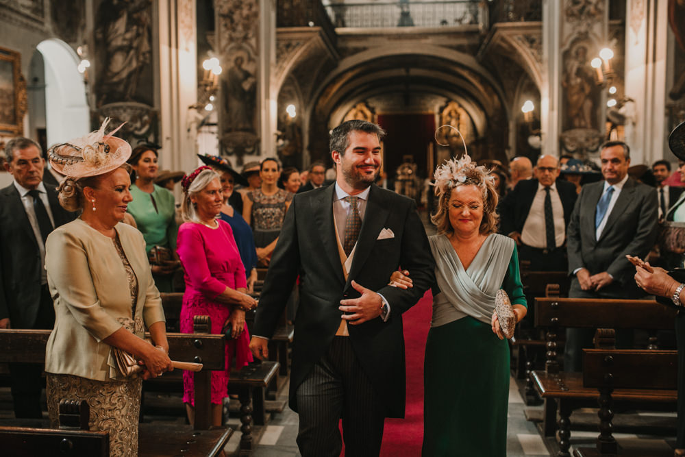 Outdoor Seville Destination Baroque Church Aisle Ceremony Groom | Colorful and Heartfelt Wedding in Spain Boda&Films