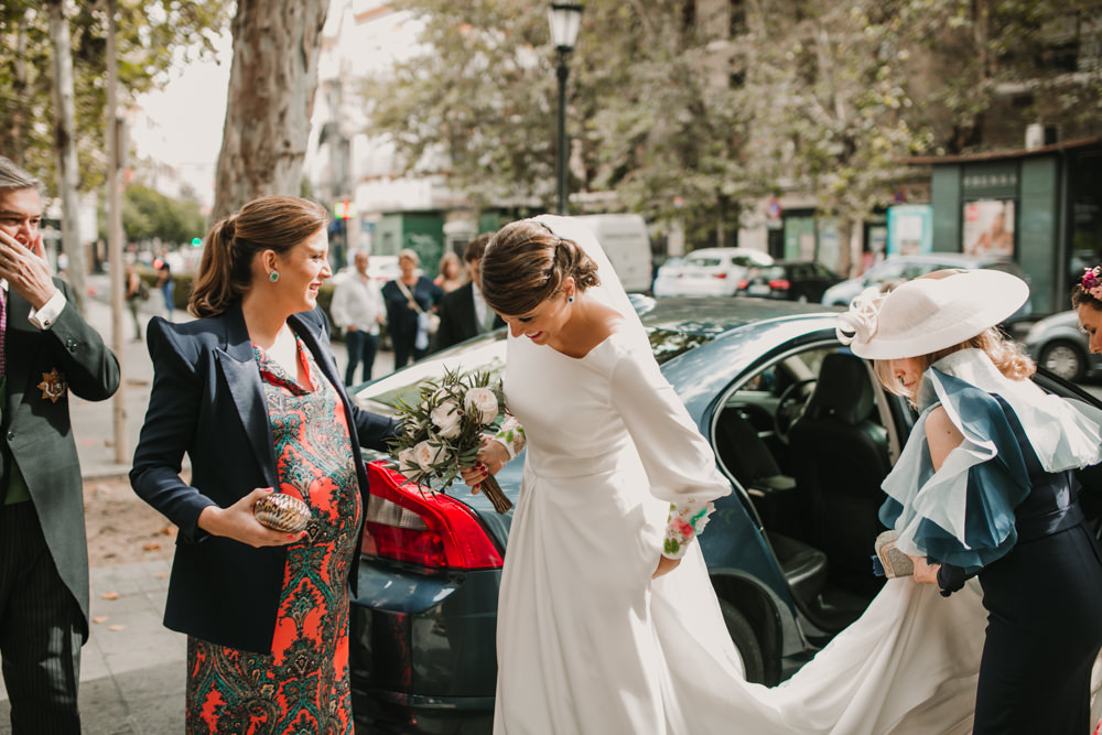 Outdoor Seville Destination Baroque Church Ceremony Bride Car | Colorful and Heartfelt Wedding in Spain Boda&Films