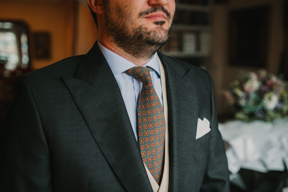 Outdoor Seville Destination Grey Suit Groom Red Tie Morning Prep | Colorful and Heartfelt Wedding in Spain Boda&Films