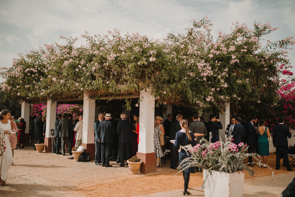 Outdoor Seville Destination Drinks Reception Villa Hacienda Floral | Colorful and Heartfelt Wedding in Spain Boda&Films