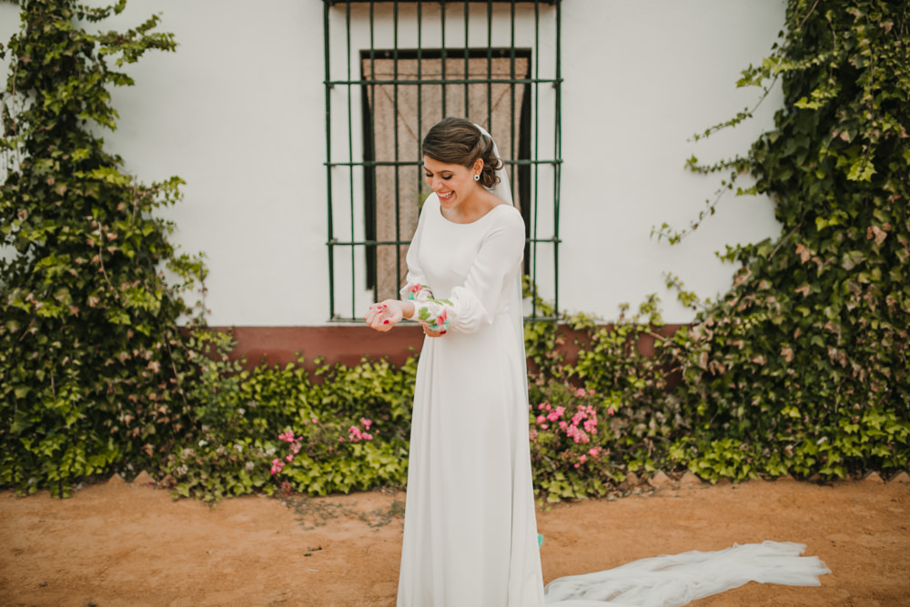 Outdoor Seville Destination Villa White Floral Flamenco Colorful Embellished White Dress | Colorful and Heartfelt Wedding in Spain Boda&Films