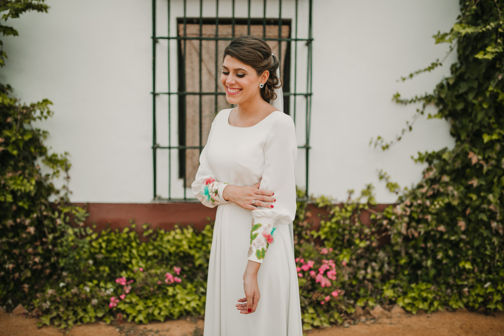 Outdoor Seville Destination Villa White Floral Flamenco Colorful Embellished White Dress | Colorful and Heartfelt Wedding in Spain Boda&Films