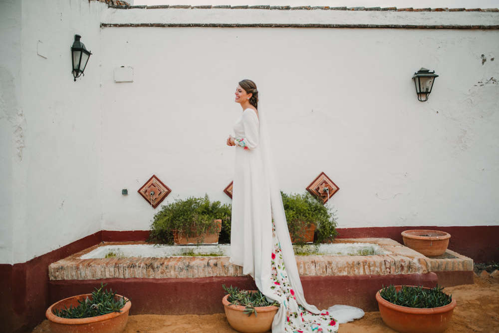 Outdoor Seville Destination Villa White Floral Flamenco Colorful Embellished White Dress | Colorful and Heartfelt Wedding in Spain Boda&Films