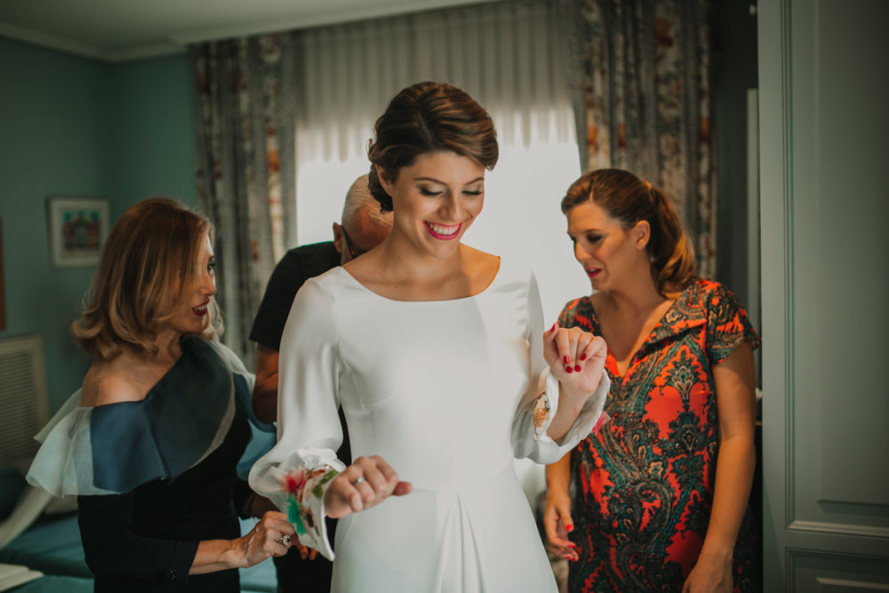 Outdoor Seville Destination Villa White Floral Flamenco Colorful Embellished White Dress Bride | Colorful and Heartfelt Wedding in Spain Boda&Films