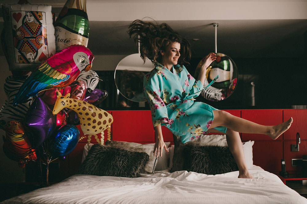 Destination Elopement Bride Morning Preparation Jumping Bed Fun | Tropical Industrial Canary Islands Wedding Ideas Moana Photography