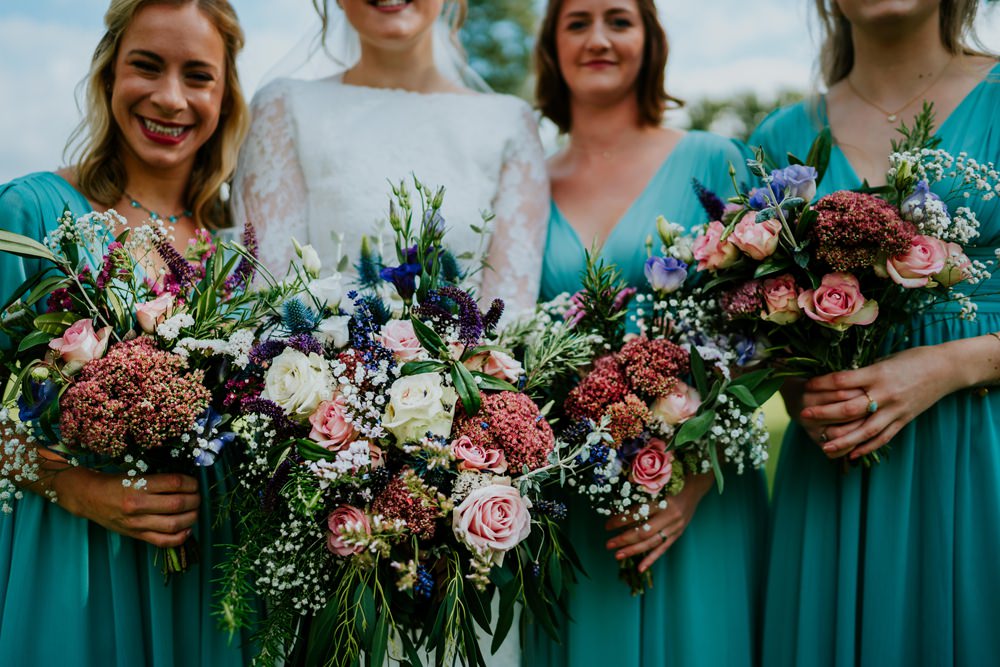 Flowers Bouquet Bride Bridal Pink Rose Fresia Foliage Greenery Lilac Bridesmaids Walcot Hall Wedding Shropshire Bridgwood Wedding Photography