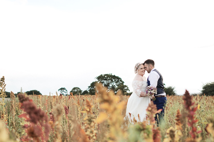 Bride Bridal A Line Sleeved Dress Gown Lace Off the Shoulder Dried Flower Floral Crown French Connection Groom Blue Waistcoat Three Piece Wood Farm Barn Wedding Suffolk Faye Amare Photography