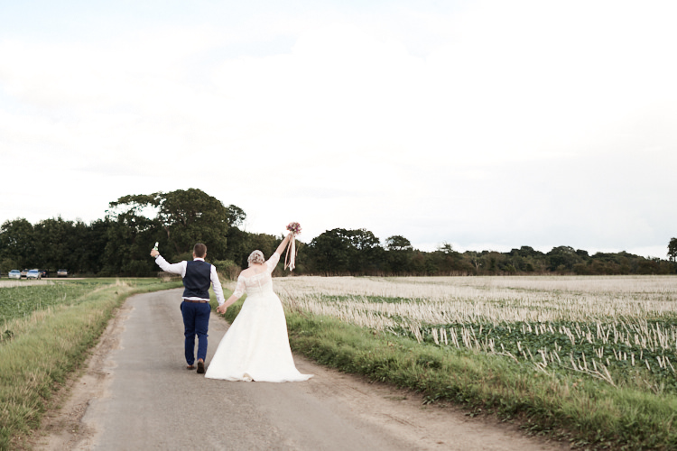 Bride Bridal A Line Sleeved Dress Gown Lace Off the Shoulder Dried Flower Floral Crown French Connection Groom Blue Waistcoat Three Piece Wood Farm Barn Wedding Suffolk Faye Amare Photography