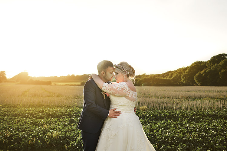 Bride Bridal A Line Sleeved Dress Gown Lace Off the Shoulder Dried Flower Floral Crown French Connection Groom Blue Waistcoat Three Piece Wood Farm Barn Wedding Suffolk Faye Amare Photography
