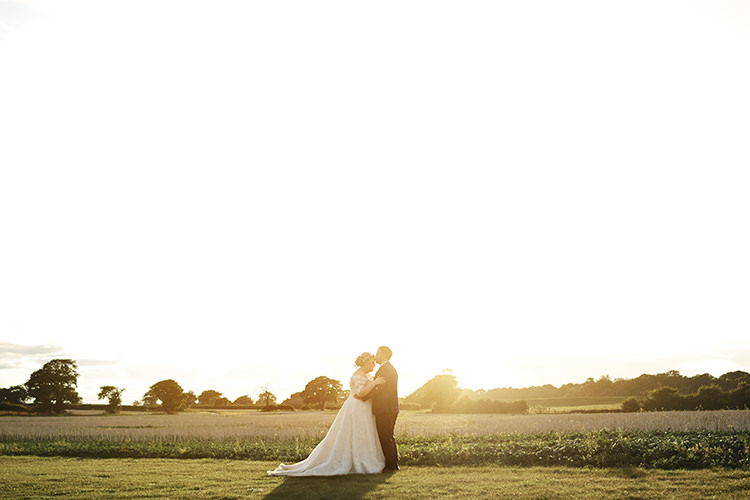 Bride Bridal A Line Sleeved Dress Gown Lace Off the Shoulder Dried Flower Floral Crown French Connection Groom Blue Waistcoat Three Piece Wood Farm Barn Wedding Suffolk Faye Amare Photography