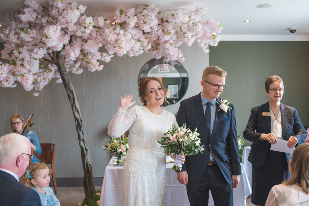 Bride Bridal Lace Long Sleeve Savannah Miller Dress Gown Navy Hugo Boss Groom Pink Rose Bouquet Blossom Tree Ceremony Backdrop 60 Hope Street Wedding Lisa Howard Photography