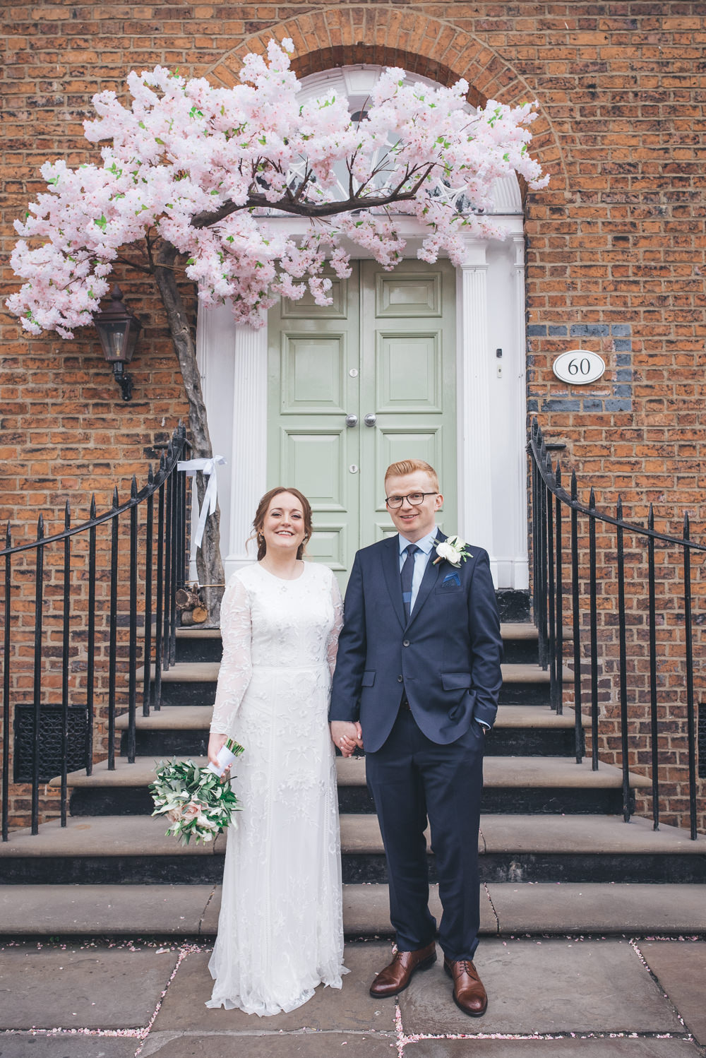 Bride Bridal Lace Long Sleeve Savannah Miller Dress Gown Navy Hugo Boss Groom Pink Rose Bouquet Blossom Tree 60 Hope Street Wedding Lisa Howard Photography