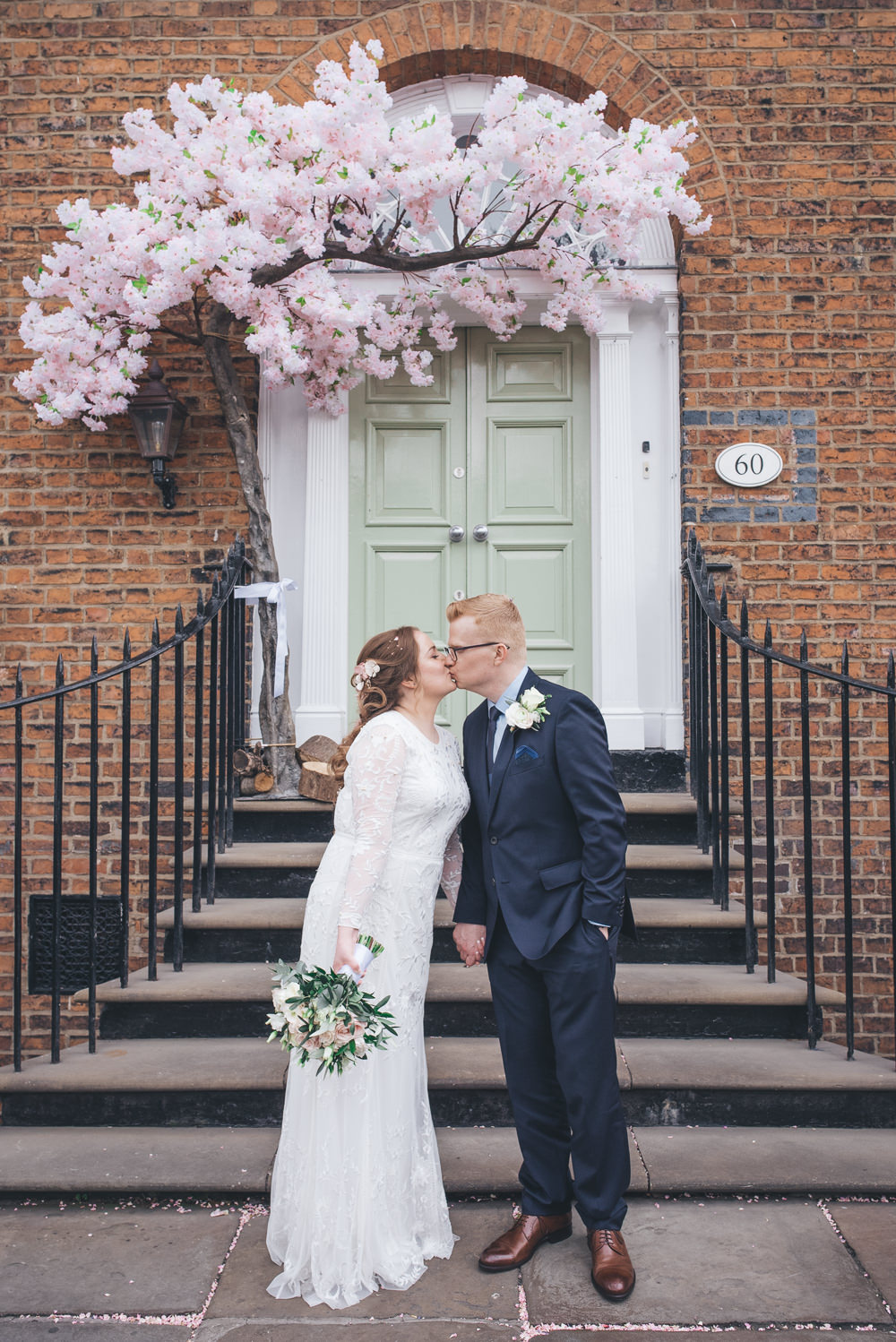 Bride Bridal Lace Long Sleeve Savannah Miller Dress Gown Navy Hugo Boss Groom Pink Rose Bouquet Blossom Tree 60 Hope Street Wedding Lisa Howard Photography