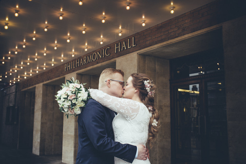Bride Bridal Lace Long Sleeve Savannah Miller Dress Gown Navy Hugo Boss Groom Pink Rose Bouquet Kiss 60 Hope Street Wedding Lisa Howard Photography
