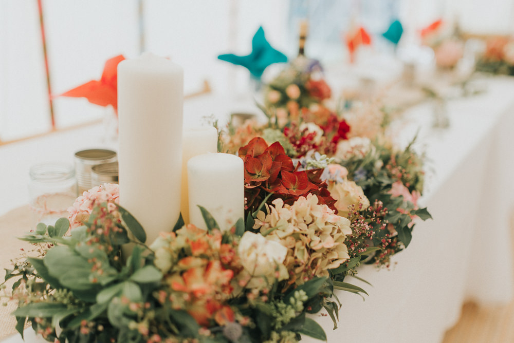 Top Table Flower Arrangement Candles Hydrangeas Red Greenery Countryside Wedding Cotswolds Kate Waters Photography