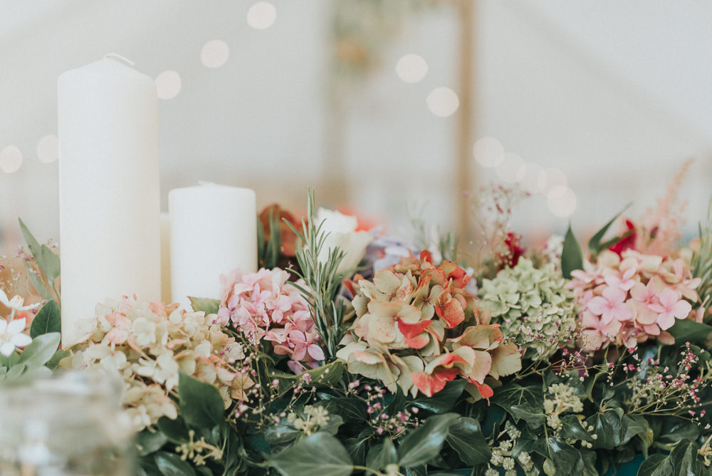 Top Table Flower Arrangement Candles Hydrangeas Red Greenery Countryside Wedding Cotswolds Kate Waters Photography