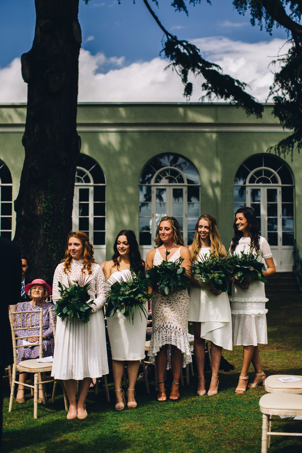 White Mismatched Bridesmaid Dresses Tropical Bouquets Palm Leaves Deer Park Country House Hotel Wedding Richard Skins Photography