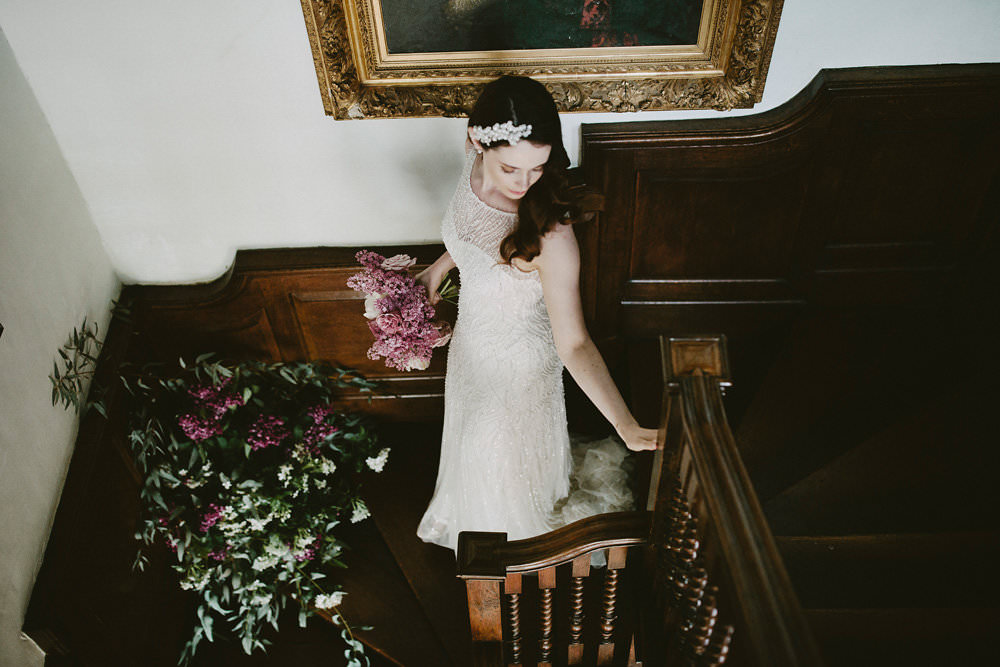 Bride Bridal Beaded Dress Gown Pearl Hairpiece Bouquet Pink White Blousy Flowers Floral Staircase Glamorous Vintage Eggington House Wedding Ideas David Jenkins Photography