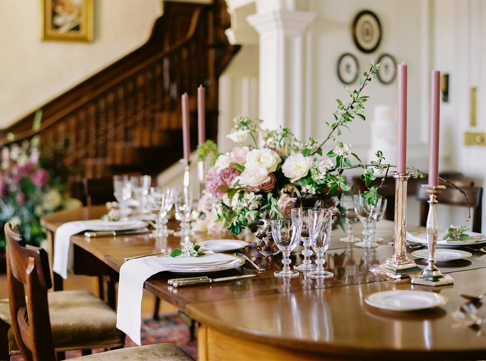Table Setting 1930s Tableware Glasses Candlesticks Pink Flowers Floral Glamorous Vintage Eggington House Wedding Ideas David Jenkins Photography