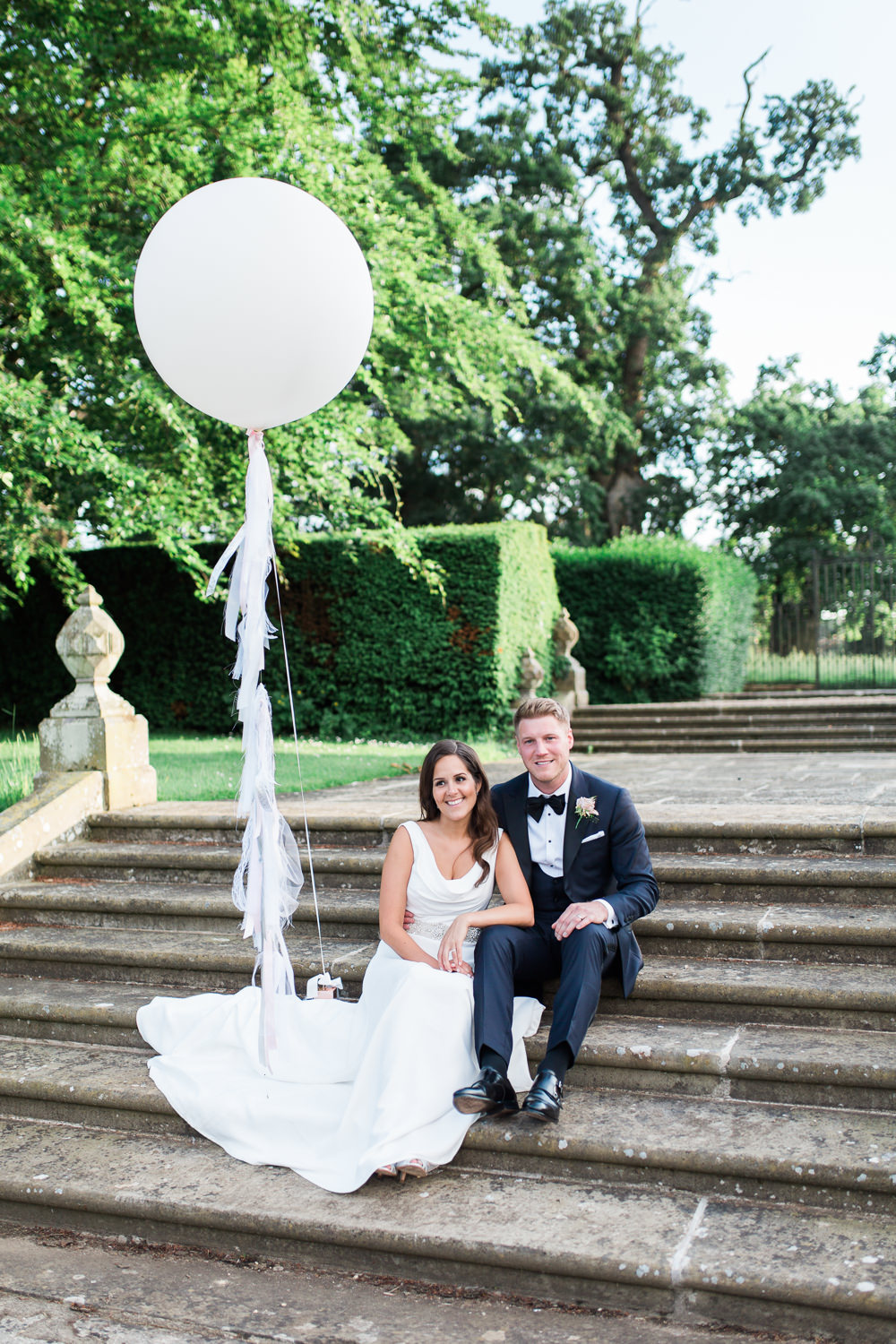Bride Bridal Dress Gown Cowl Neck Train Tuxedo Groom Bib Waistcoat Pocket Square Giant Balloon Hengrave Hall Wedding Gemma Giorgio Photography