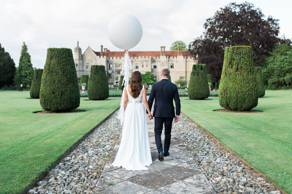 Bride Bridal Dress Gown Cowl Neck Train Tuxedo Groom Giant Balloon Tassels Hengrave Hall Wedding Gemma Giorgio Photography