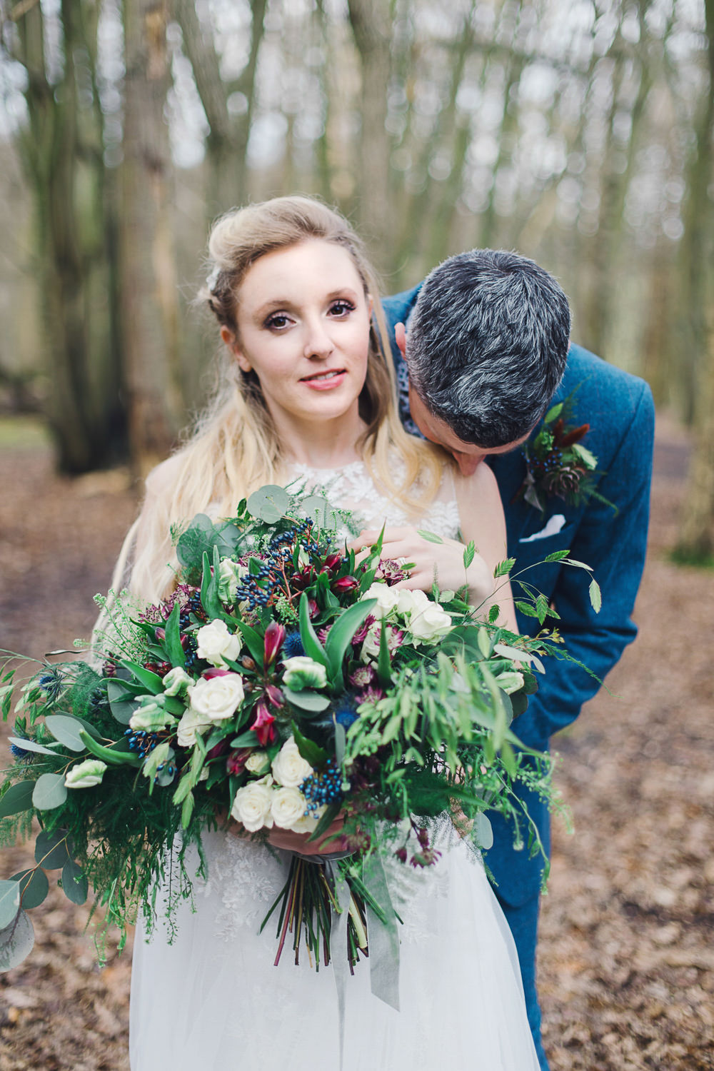 Bouquet Flowers Bride Bridal Greenery Foliage Rose Berry Burgundy Thistle Nordic Woodland Elopement Wedding Ideas Nina Wernicke Photography