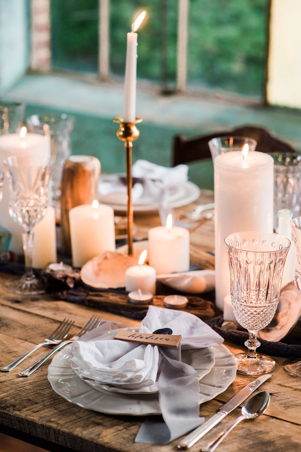 Nature Inspired Styled Shoot Seashell Tablescape Candles Grey Blue Gold Crystal Glasses Silk Ribbon | Ocean Wedding Ideas Industrial Rachel Watkinson Photography