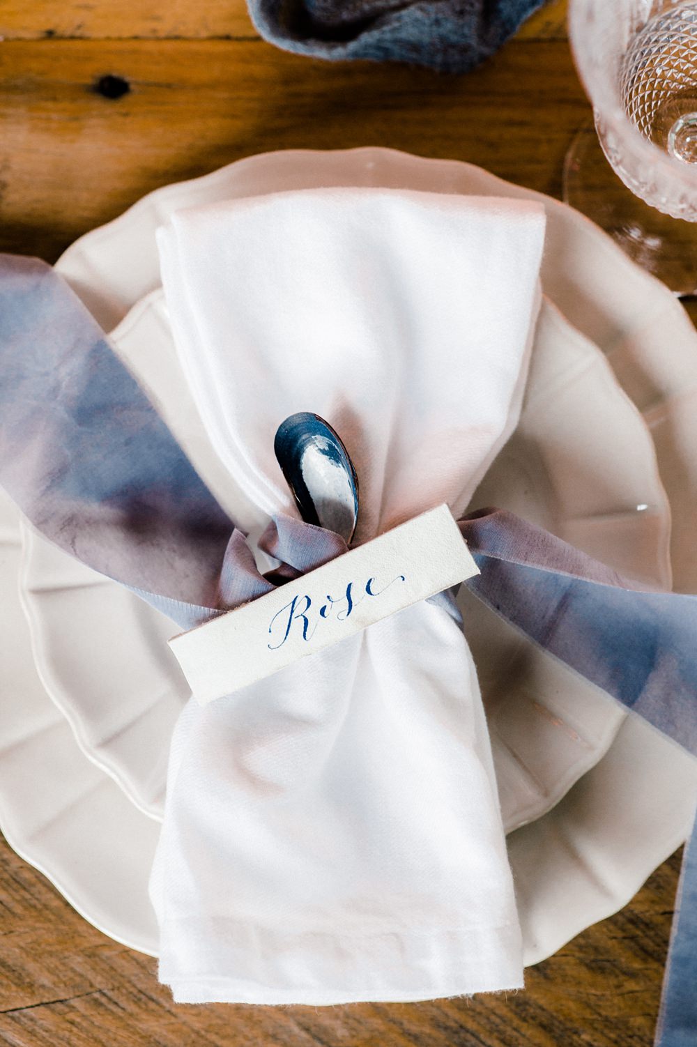 Nature Inspired Styled Shoot Seashell Tablescape Grey Blue Silk Ribbon Calligraphy Place Card Oyster | Ocean Wedding Ideas Industrial Rachel Watkinson Photography