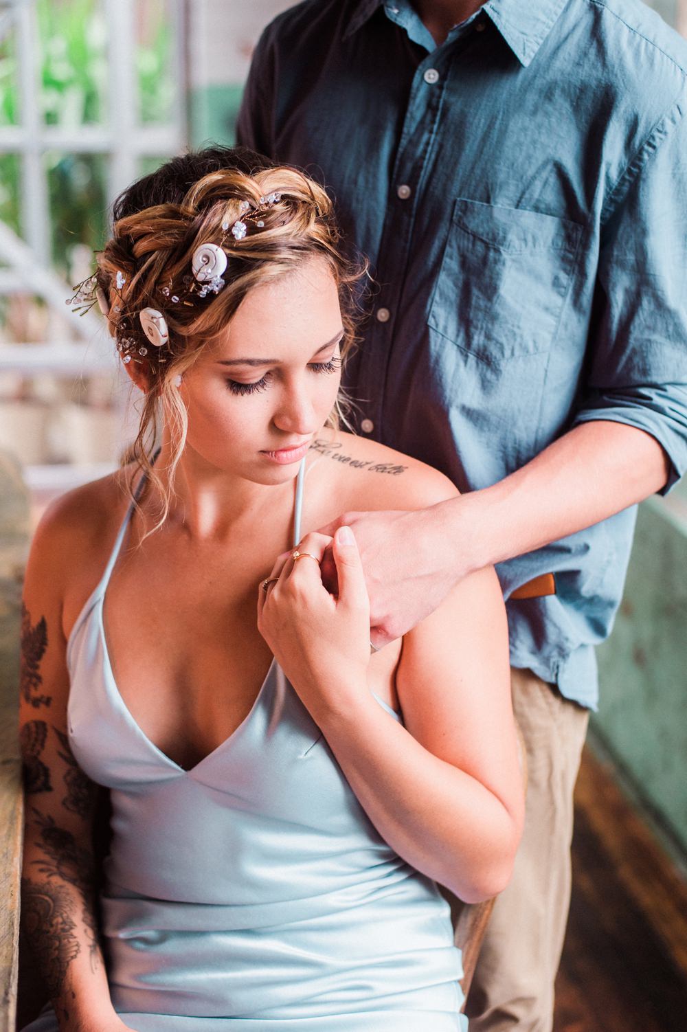Nature Inspired Styled Shoot Seashell Headpiece Updo Tattooed Bride Blue Dress Casual Groom Shirt | Ocean Wedding Ideas Industrial Rachel Watkinson Photography