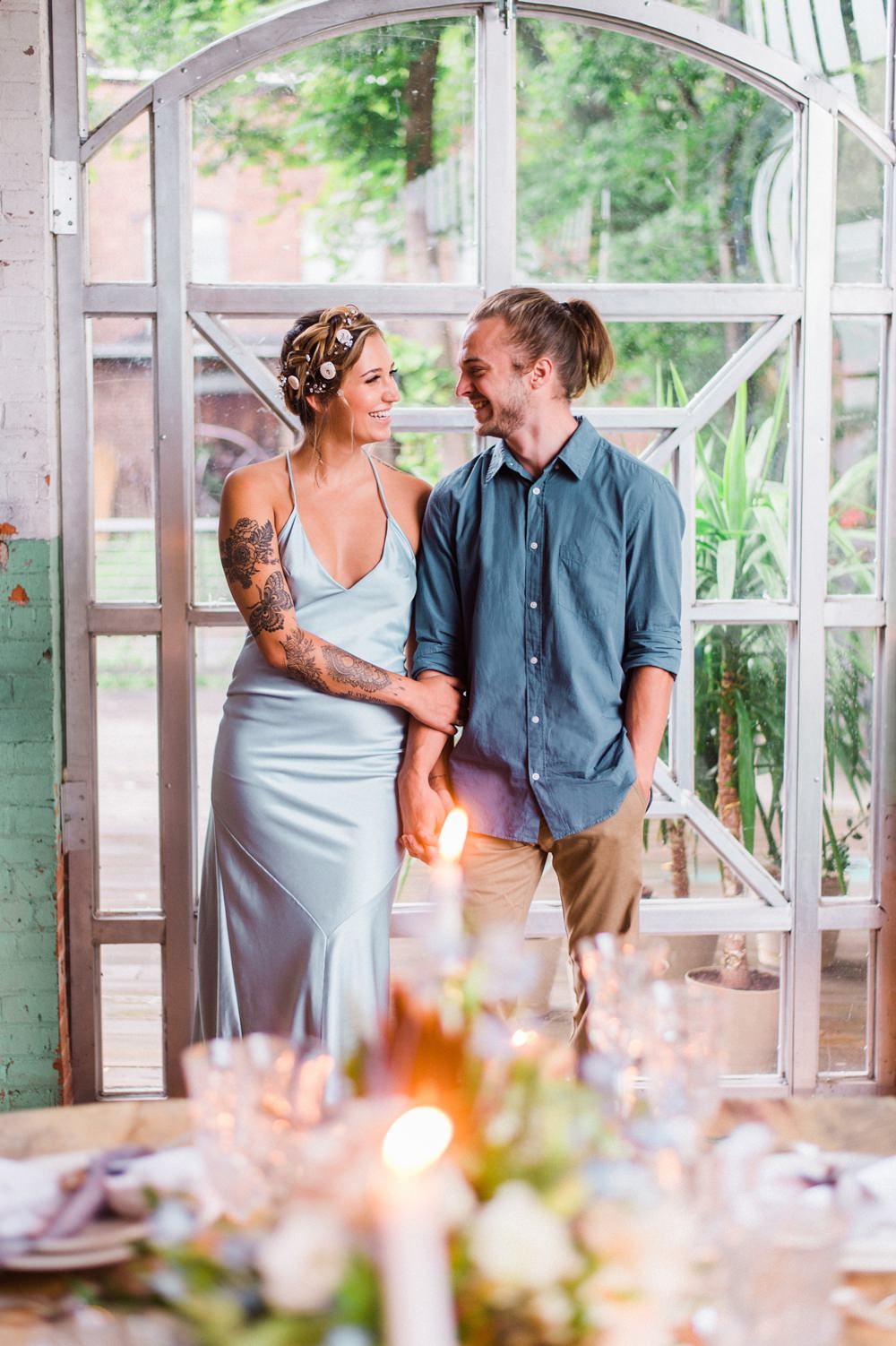Nature Inspired Styled Shoot Seashell Headpiece Updo Tattooed Bride Blue Dress Casual Groom Shirt | Ocean Wedding Ideas Industrial Rachel Watkinson Photography