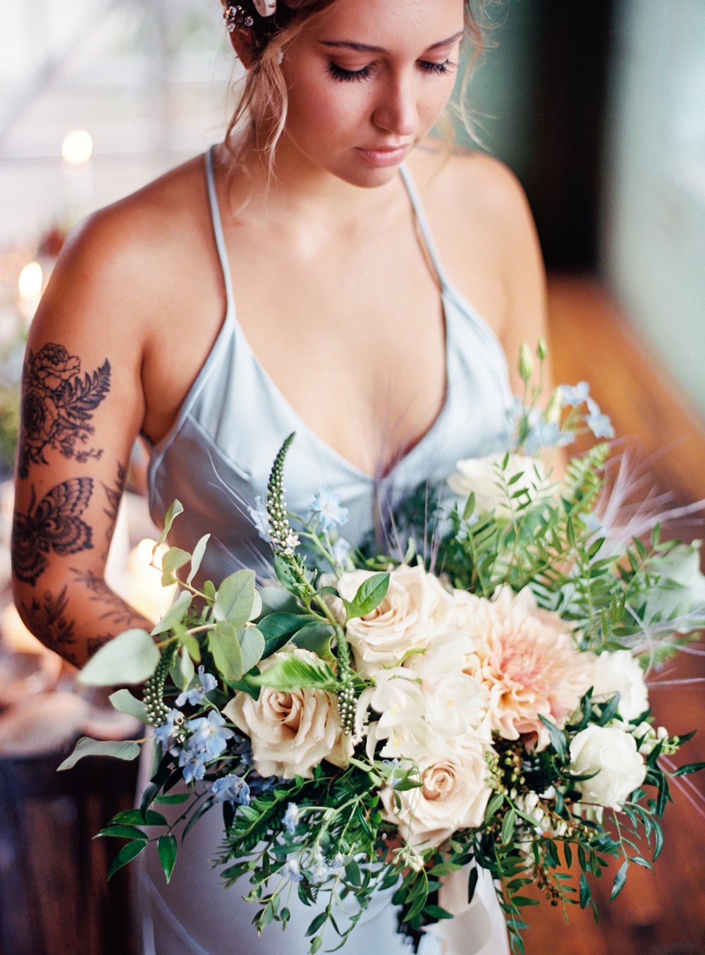 Nature Inspired Styled Shoot Seashell Headpiece Updo Tattooed Bride Blue Dress Casual Groom Shirt Pastel Dahlia Bouquet | Ocean Wedding Ideas Industrial Rachel Watkinson Photography