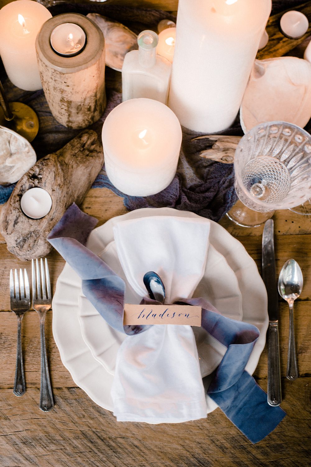 Nature Inspired Styled Shoot Seashell Tablescape Grey Blue Silk Ribbon Calligraphy Place Card Oyster Candles Driftwood | Ocean Wedding Ideas Industrial Rachel Watkinson Photography