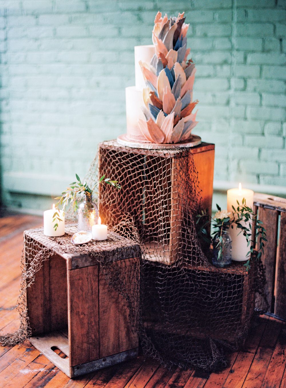 Nature Inspired Styled Shoot Seashell Grey Blue Coral Brushstroke Cake Candles Driftwood Crates | Ocean Wedding Ideas Industrial Rachel Watkinson Photography