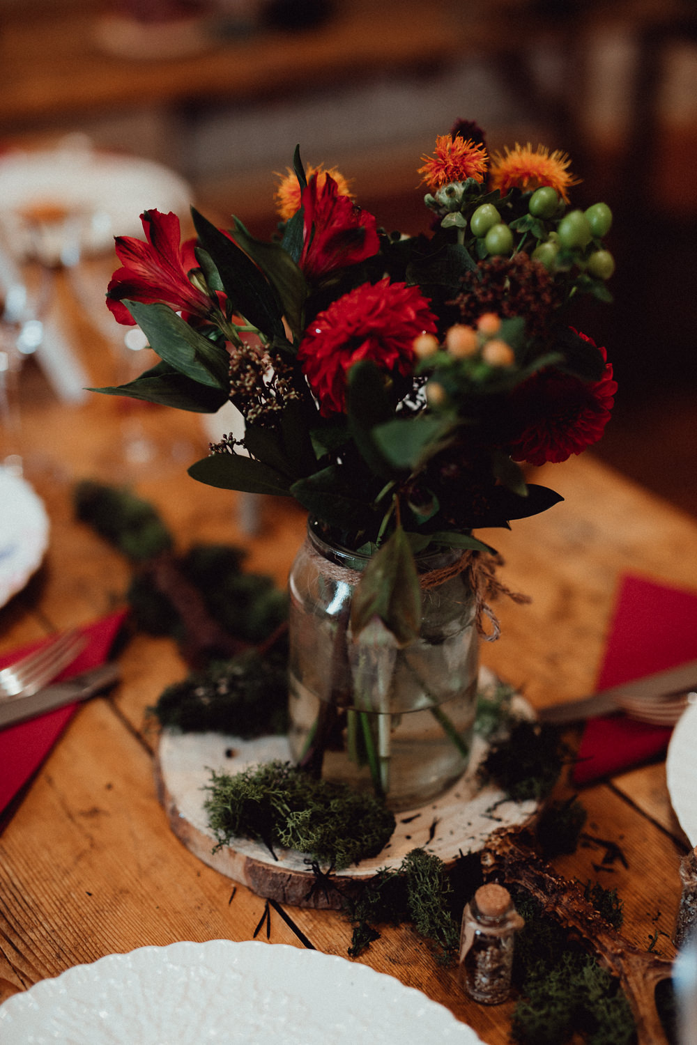 Autumn Flowers Jar Log Centrepiece Decor Red Orange Oxleaze Barn Wedding Emily and Steve Photography
