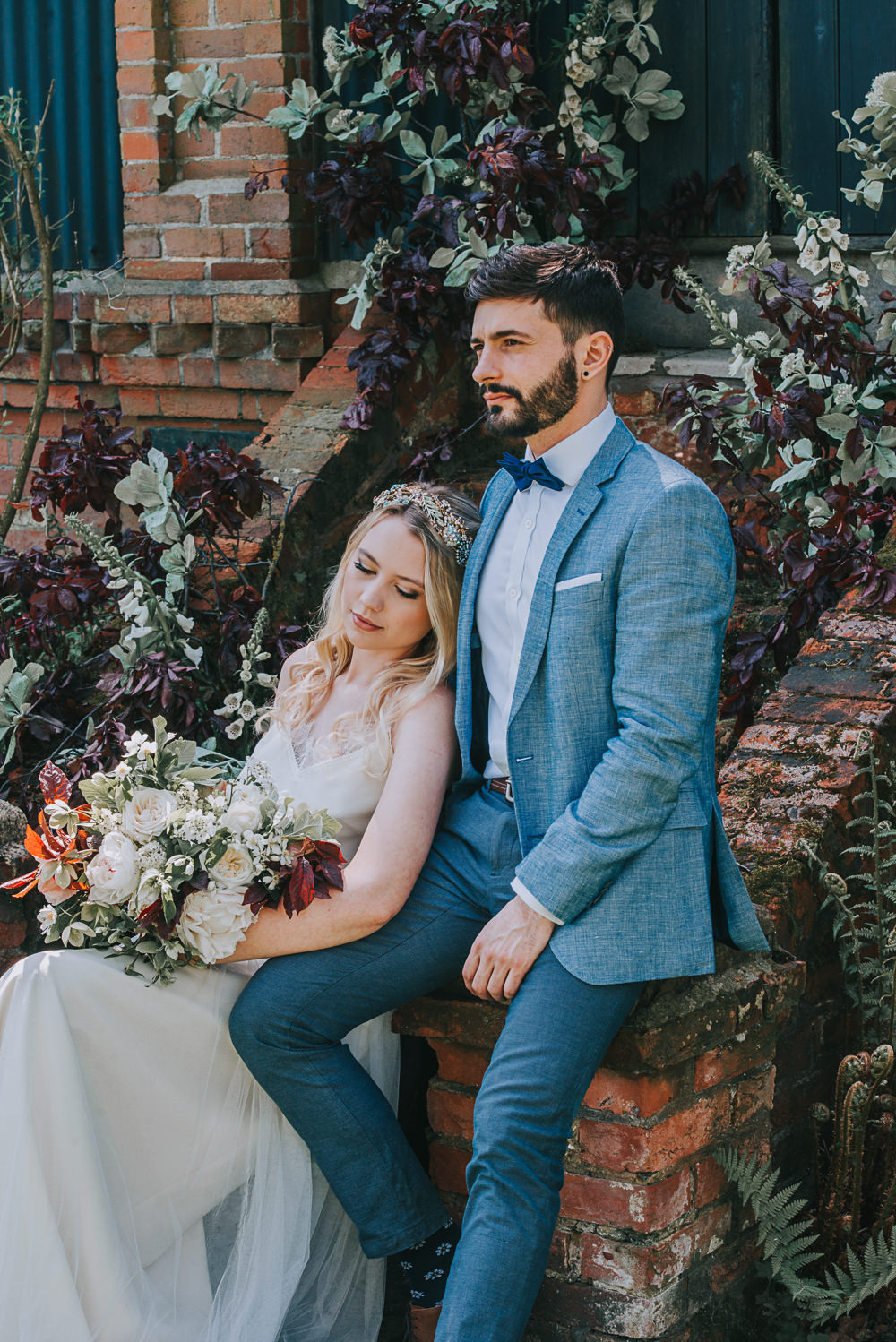Secret Dresshouse Ethereal Bride Bridal Gown Blue Linen Jacket Bow Tie Groom Leaf Foliage Flower Florals River Romance Wedding Ideas Mindy Coe Photography