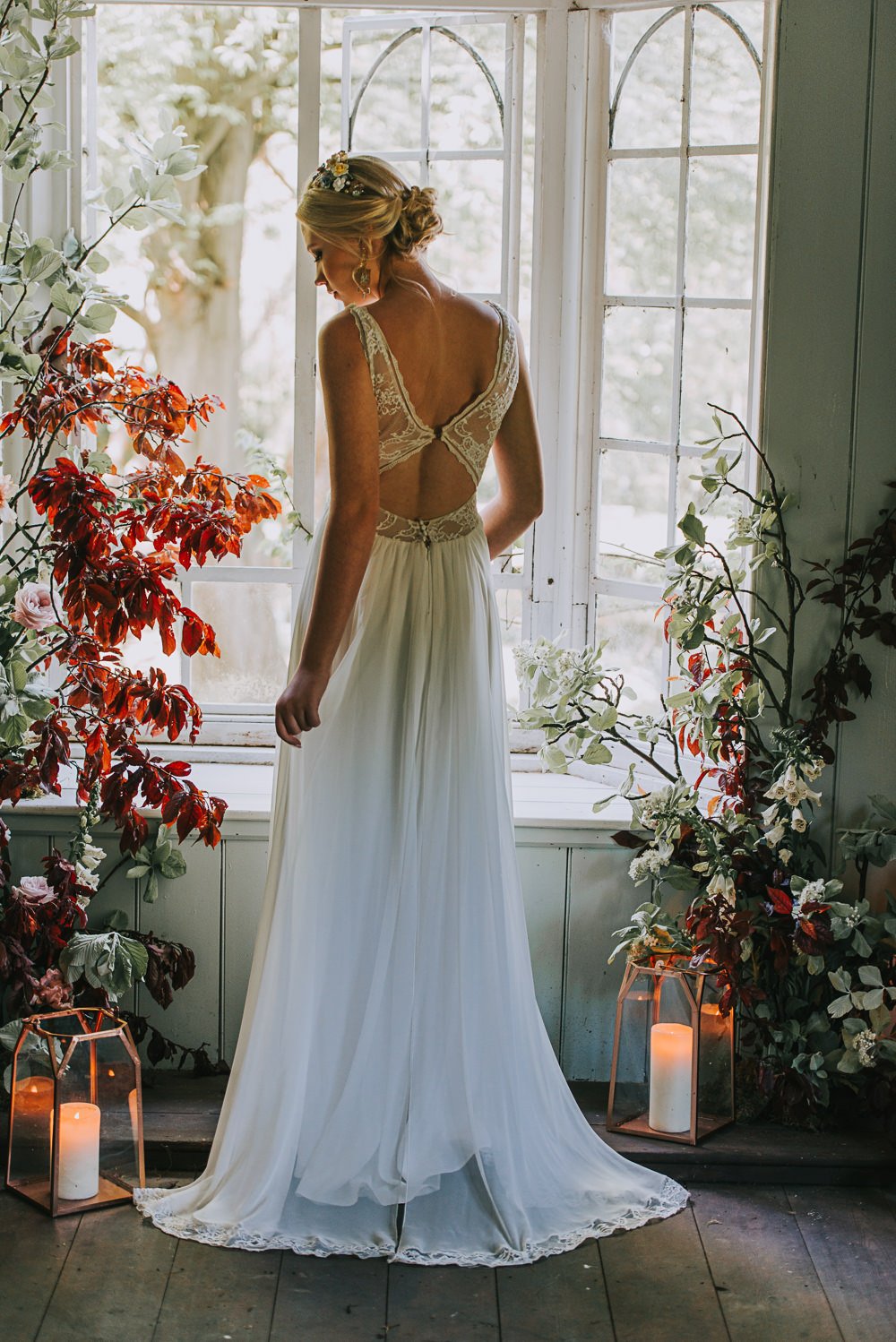 Secret Dresshouse Ethereal Bride Bridal Gown Storm Hurricane Candles Lanterns Leaf Foliage Flower Florals River Romance Wedding Ideas Mindy Coe Photography
