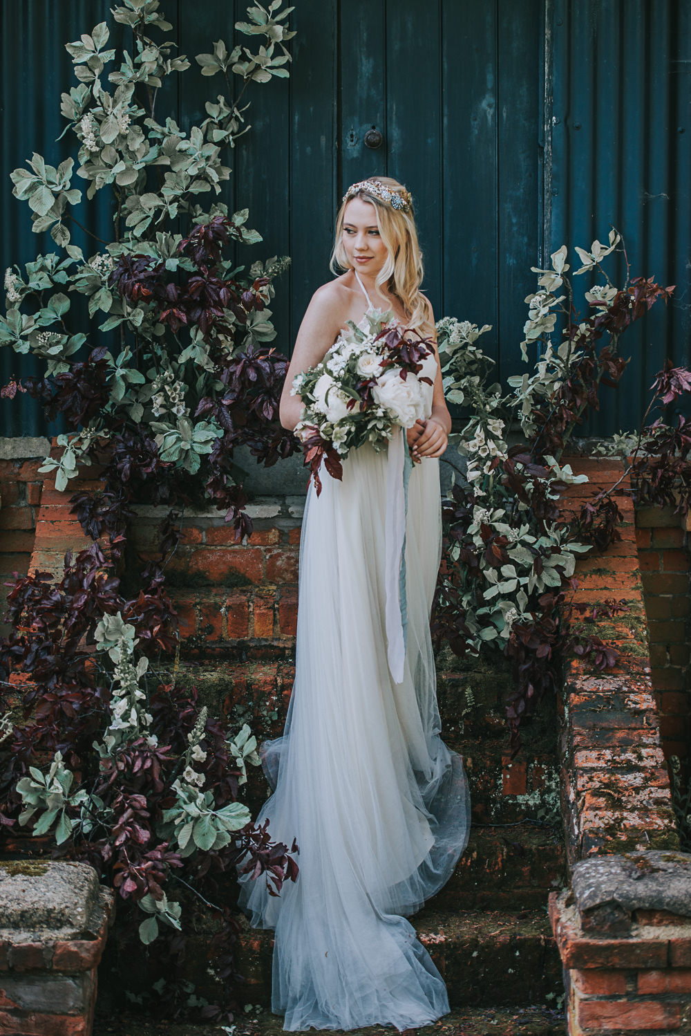 Secret Dresshouse Ethereal Bride Bridal Gown Hairpiece Leaf Foliage Flower Florals River Romance Wedding Ideas Mindy Coe Photography