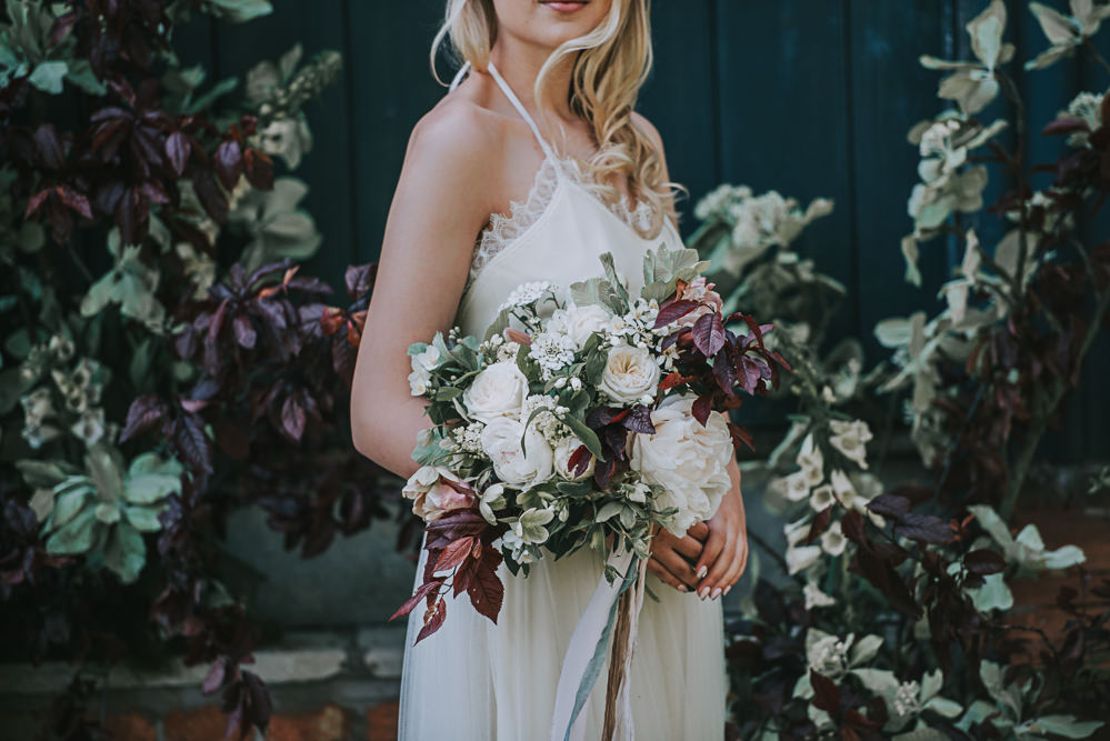 Secret Dresshouse Ethereal Bride Bridal Gown Hairpiece Leaf Foliage Flower Florals River Romance Wedding Ideas Mindy Coe Photography