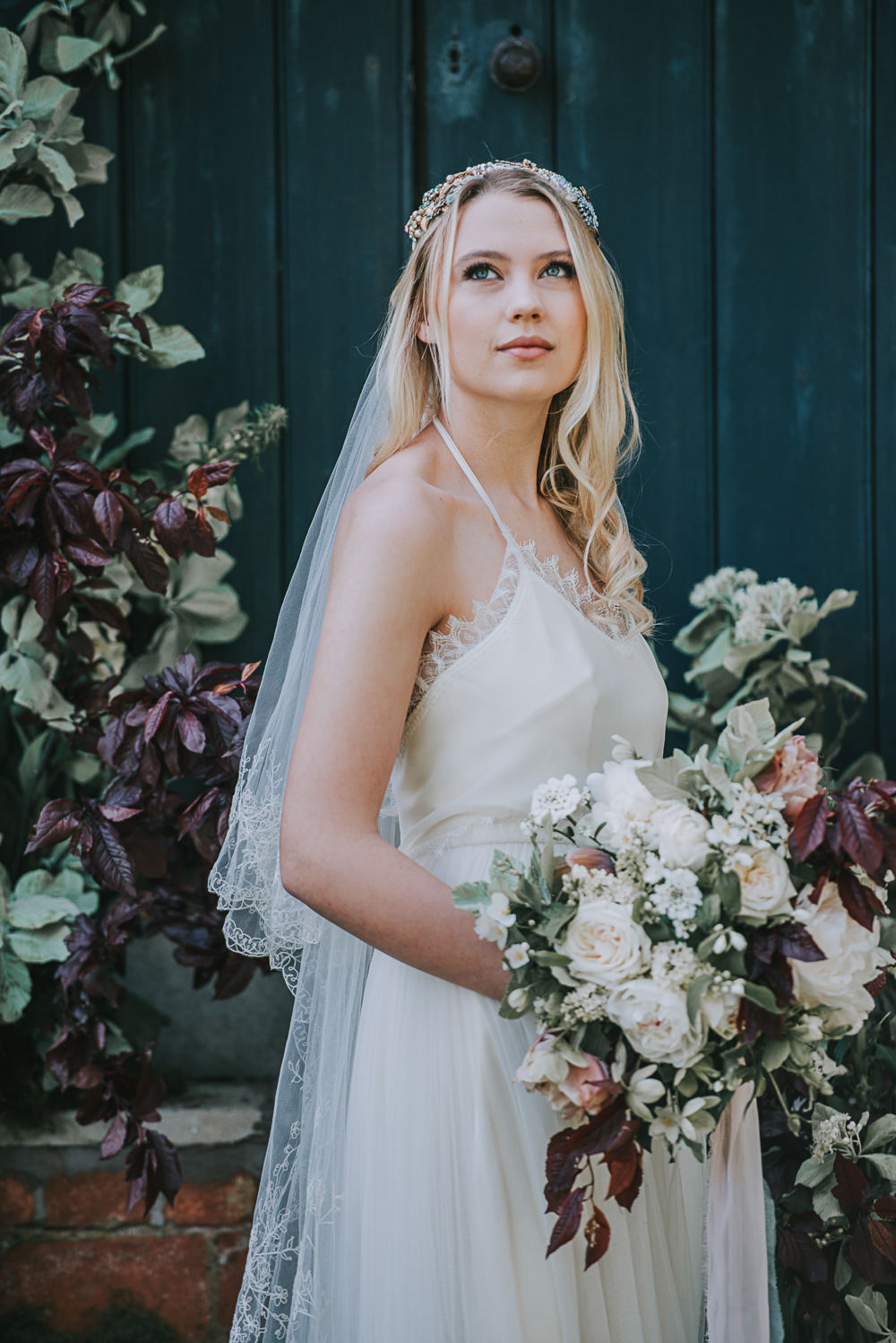 Secret Dresshouse Ethereal Bride Bridal Gown Hairpiece Leaf Foliage Flower Florals Crown Embroidered Veil River Romance Wedding Ideas Mindy Coe Photography