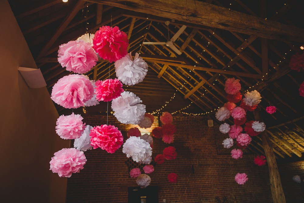 Pink White Tissue Pom Poms Decor Hanging Fairy Lights Rustic Barn Wedding Georgia Rachael Photography