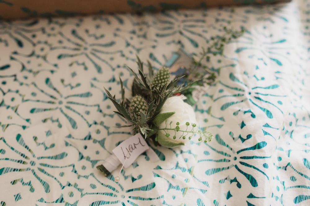 Groom Groomsmen Buttonhole Boutonnière Sea Holly Peony Southwood Hall Wedding Emily Tyler Photography