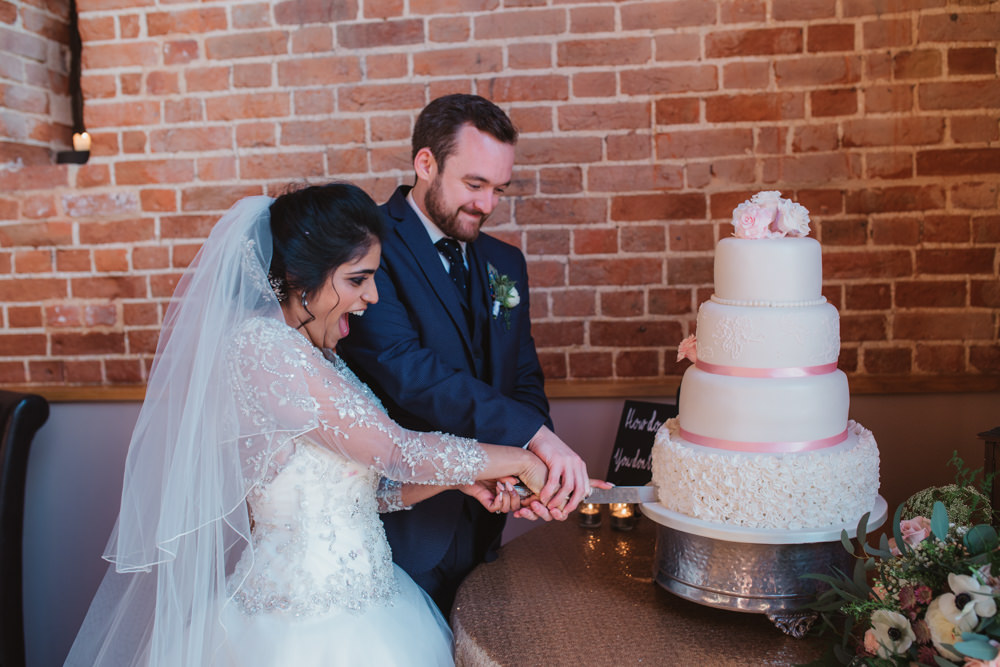 Bride Bridal Lace Long Sleeve Dress Embellished A Line Veil Hair Piece Jewelled Diamante Navy Three Piece Suit Waistcoat Groom Cake Cutting Tiered White Regal Icing Pink Ribbon Southwood Hall Wedding Emily Tyler Photography