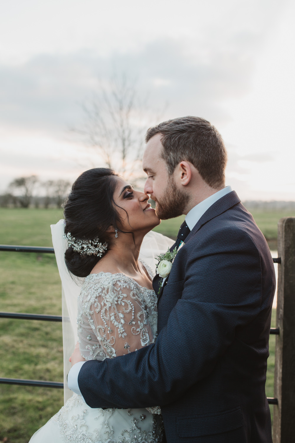 Bride Bridal Lace Long Sleeve Dress Embellished A Line Veil Leaf Hair Piece Jewelled Diamante Navy Three Piece Suit Waistcoat Groom Southwood Hall Wedding Emily Tyler Photography