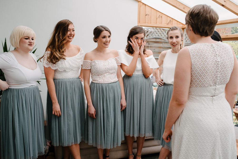 Outdoor Farm Field Marquee Bride Jesus Peiro Dress Bridesmaids Dove Grey White First Look | Rustic and Relaxed Spring Tipi Wedding Inbetween Days Photography