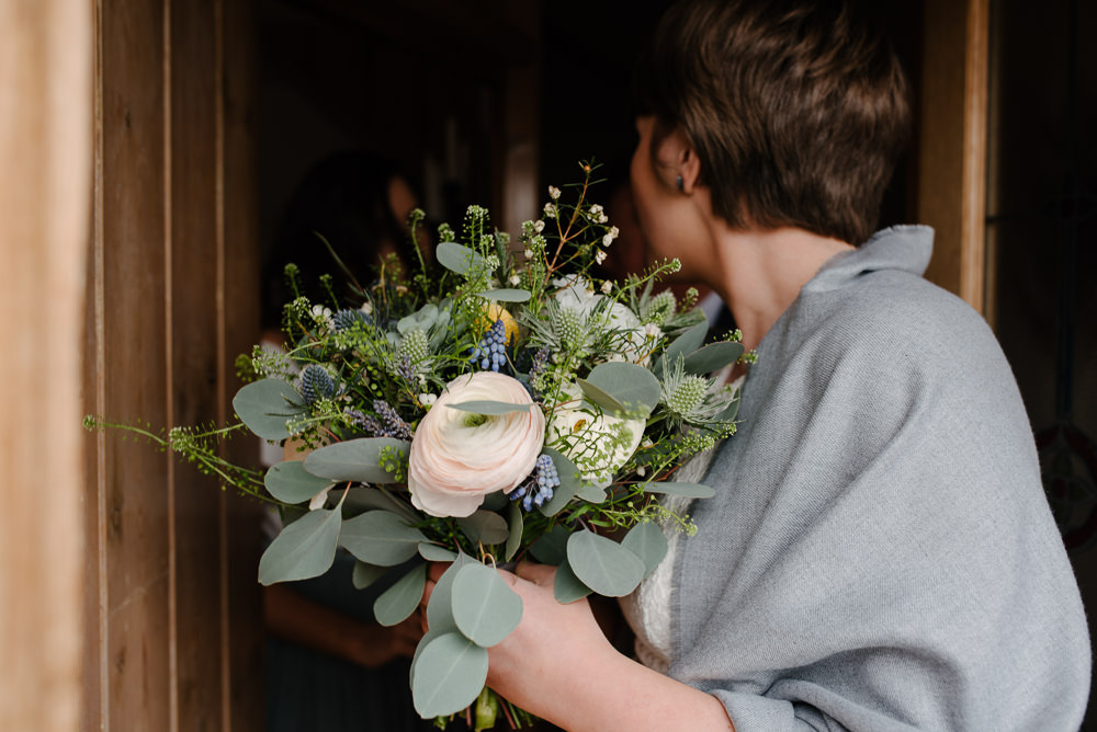 Outdoor Farm Field Marquee Bride Modern Short Pixie Cut White Green Blue Yellow Bouquet | Rustic and Relaxed Spring Tipi Wedding Inbetween Days Photography