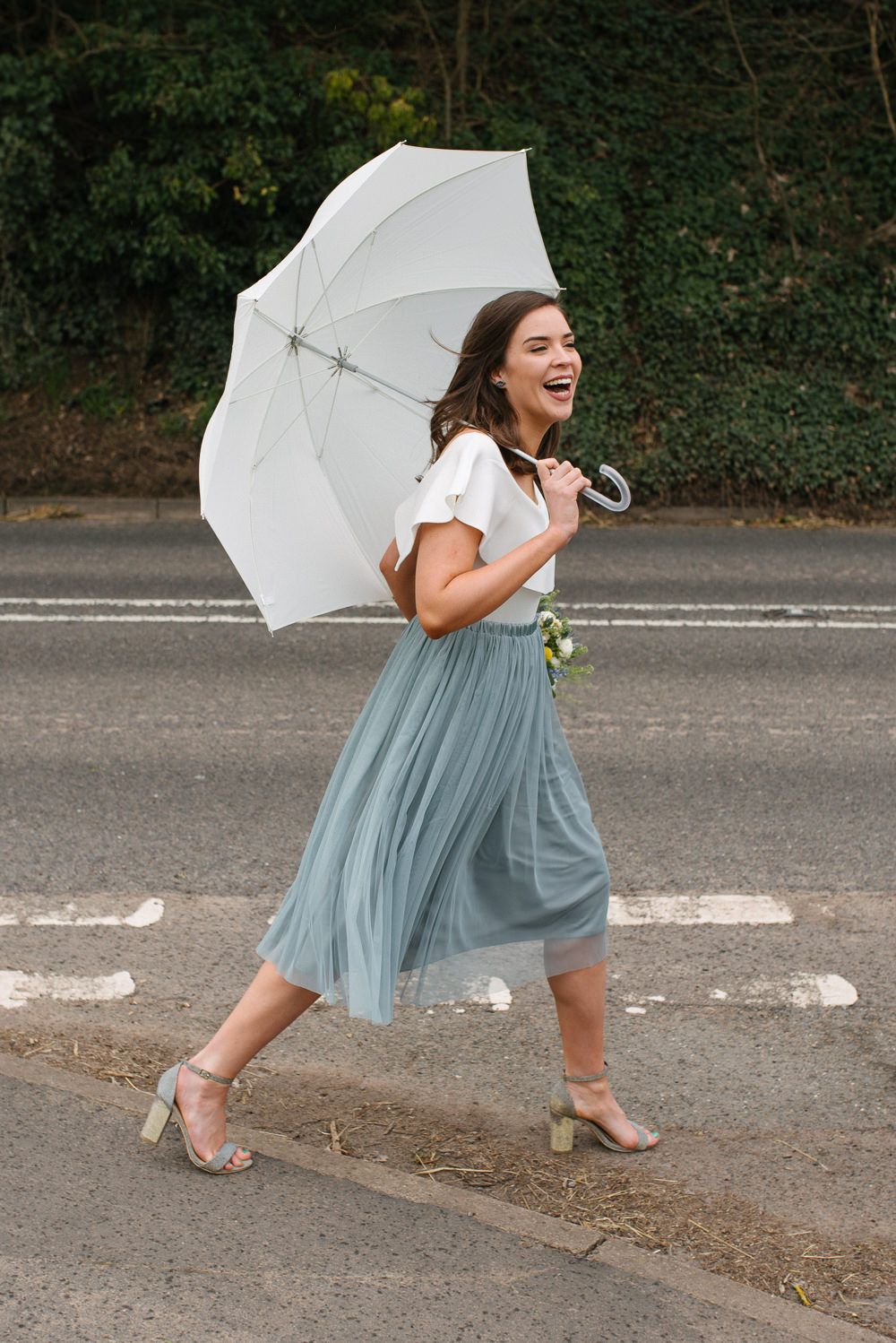 Outdoor Farm Field Marquee Bridesmaid Modern Grey Skirt White Green Yellow Bouquet | Rustic and Relaxed Spring Tipi Wedding Inbetween Days Photography