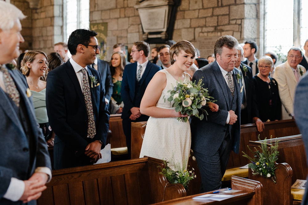 Outdoor Farm Field Marquee Groom Bride Modern Green Yellow Bouquet Church Ceremony Floral Ties | Rustic and Relaxed Spring Tipi Wedding Inbetween Days Photography
