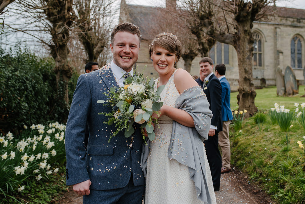 Outdoor Farm Field Marquee Groom Bride Modern Green Yellow Bouquet Confetti Church | Rustic and Relaxed Spring Tipi Wedding Inbetween Days Photography